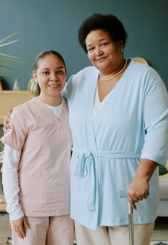 Caregiver and Senior smiling